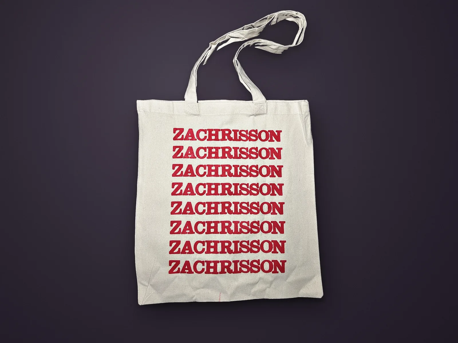 The bone tote bag that comes with the print